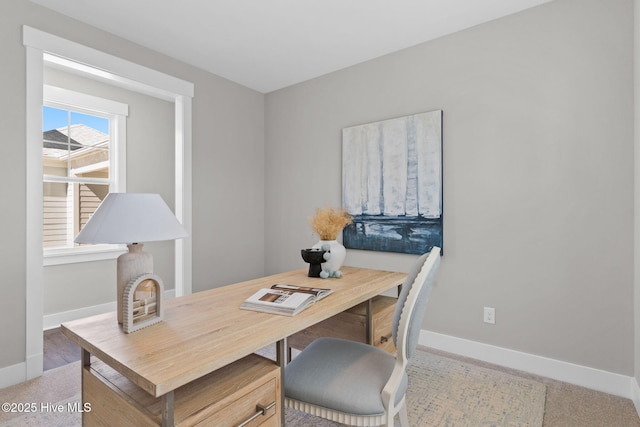 office area featuring baseboards