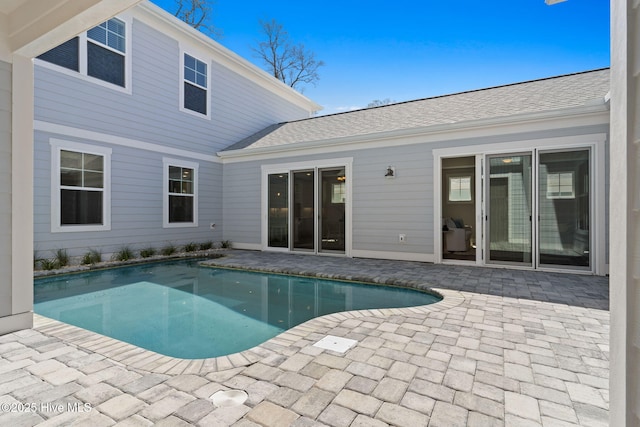 outdoor pool with a patio