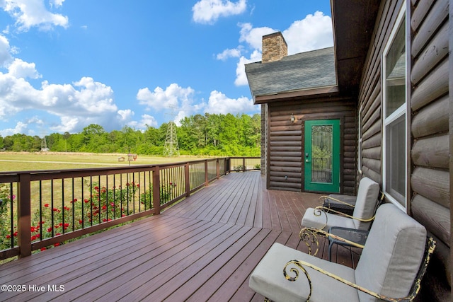 181 Kirkpatrick Ln, Red Springs, NC 28377 - wooden deck featuring view of wooded area