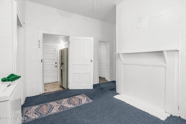 unfurnished bedroom with carpet floors