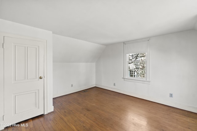 306 S Oakum St, Edenton, NC 27932 - bonus room with lofted ceiling, wood-type flooring, and baseboards