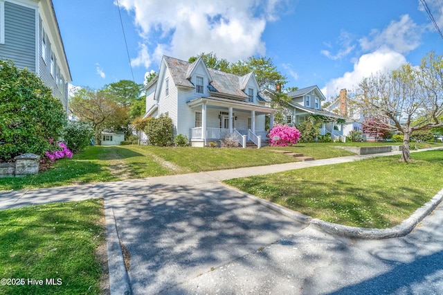 306 S Oakum St, Edenton, NC 27932 - view of front of home featuring covered porch and a front yard