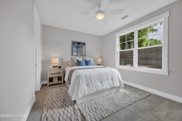 bedroom featuring carpet flooring, baseboards, and ceiling fan