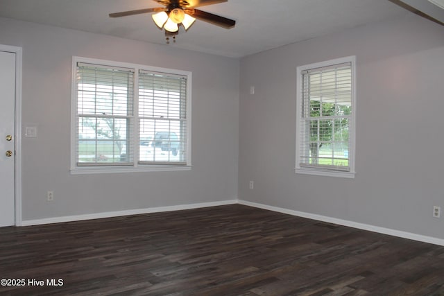 118 Turtle Shell Rd, Richlands, NC 28574 - unfurnished room featuring plenty of natural light, ceiling fan, dark wood finished floors, and baseboards