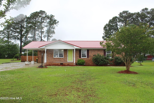 118 Turtle Shell Rd, Richlands, NC 28574 - single story home featuring a front yard, crawl space, brick siding, metal roof, and driveway