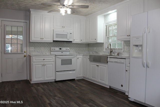 118 Turtle Shell Rd, Richlands, NC 28574 - kitchen with white appliances, tasteful backsplash, ceiling fan, white cabinets, and a sink