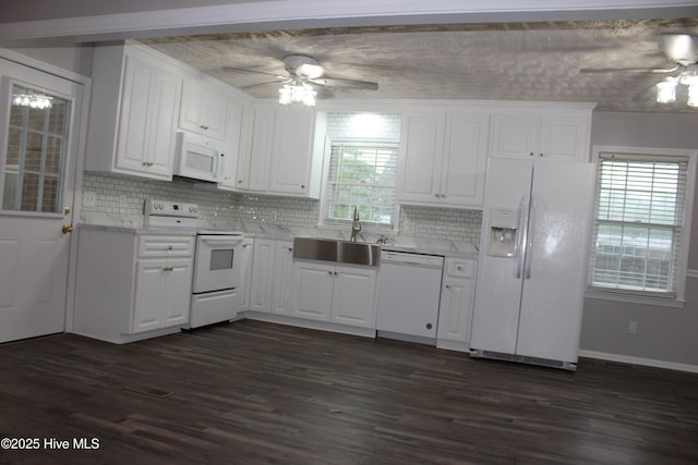 118 Turtle Shell Rd, Richlands, NC 28574 - kitchen with white appliances, a ceiling fan, a sink, light countertops, and dark wood-style flooring