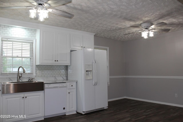118 Turtle Shell Rd, Richlands, NC 28574 - kitchen with white appliances, ceiling fan, a sink, a textured ceiling, and dark wood-style floors