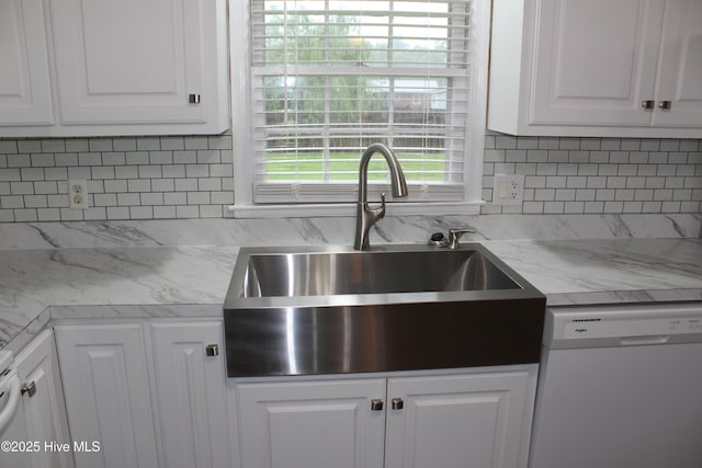 118 Turtle Shell Rd, Richlands, NC 28574 - kitchen with white dishwasher, a sink, white cabinets, and tasteful backsplash