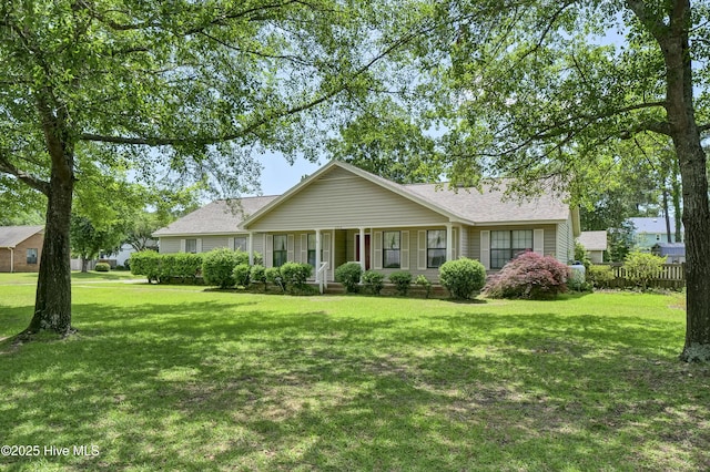 ranch-style home with a porch and a shingled roof