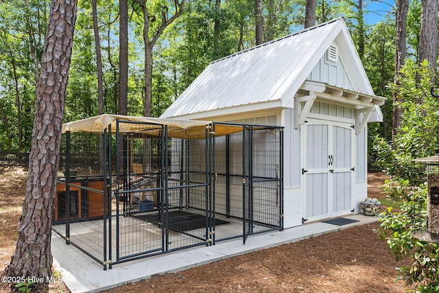 view of outbuilding featuring an exterior structure and an outdoor structure