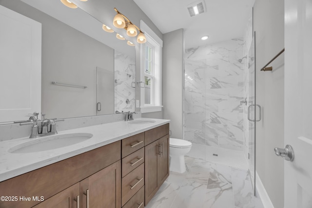 full bathroom featuring marble look tile flooring, a marble finish shower, double vanity, toilet, and recessed lighting