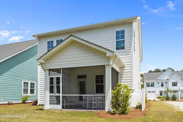 160 Freedom Park Rd, Beaufort, NC 28516 - back of house with a sunroom and a yard