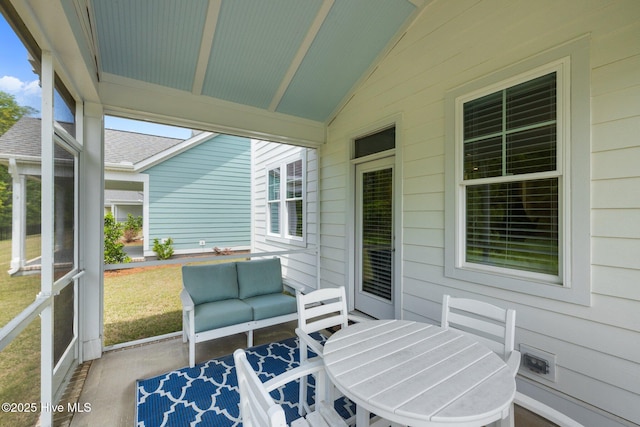 160 Freedom Park Rd, Beaufort, NC 28516 - sunroom / solarium with lofted ceiling, outdoor lounge area, and outdoor dining space