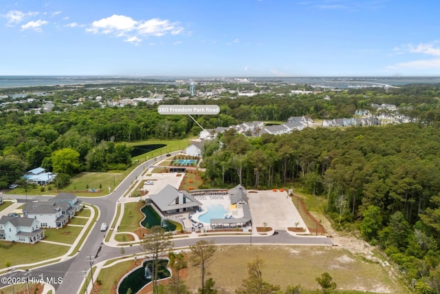 160 Freedom Park Rd, Beaufort, NC 28516 - aerial view of property and surrounding area with a pool area, a heavily wooded area, and a large body of water