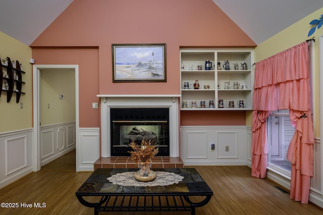 1992 Acorn Dr, New Bern, NC 28562 - living area featuring wood finished floors, a tile fireplace, and high vaulted ceiling