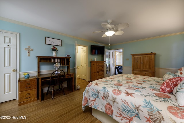 1992 Acorn Dr, New Bern, NC 28562 - bedroom featuring wood finished floors, an office area, crown molding, and ceiling fan