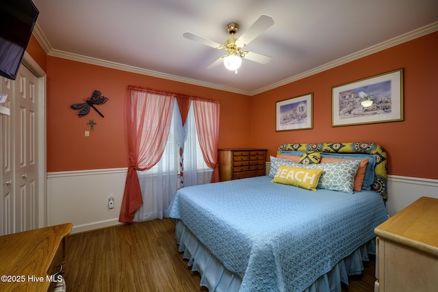 1992 Acorn Dr, New Bern, NC 28562 - bedroom with crown molding, wood finished floors, a closet, and a ceiling fan