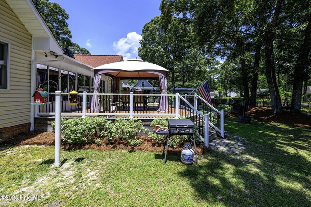 1992 Acorn Dr, New Bern, NC 28562 - view of grassy yard with a gazebo and a wooden deck
