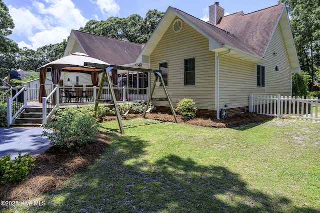 1992 Acorn Dr, New Bern, NC 28562 - back of house with a gazebo, roof with shingles, a chimney, a deck, and crawl space