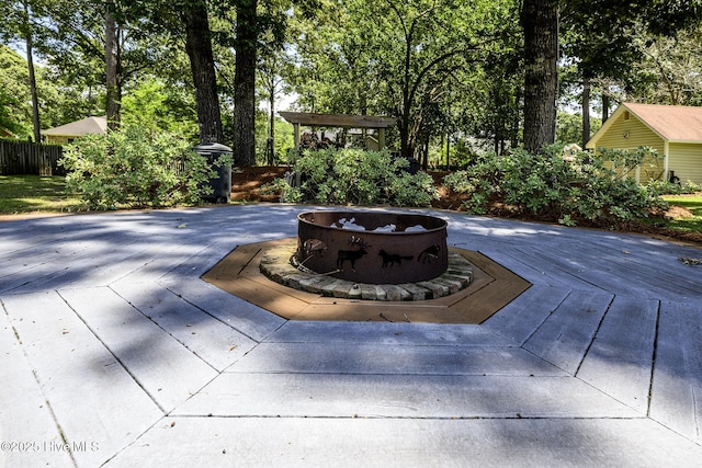 1992 Acorn Dr, New Bern, NC 28562 - wooden terrace with an outdoor fire pit