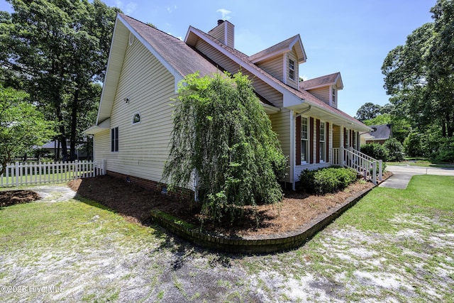 1992 Acorn Dr, New Bern, NC 28562 - view of side of property featuring covered porch and a chimney