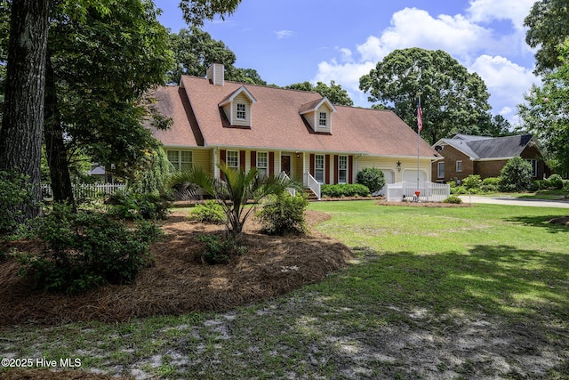 1992 Acorn Dr, New Bern, NC 28562 - cape cod-style house featuring an attached garage, a chimney, covered porch, and driveway