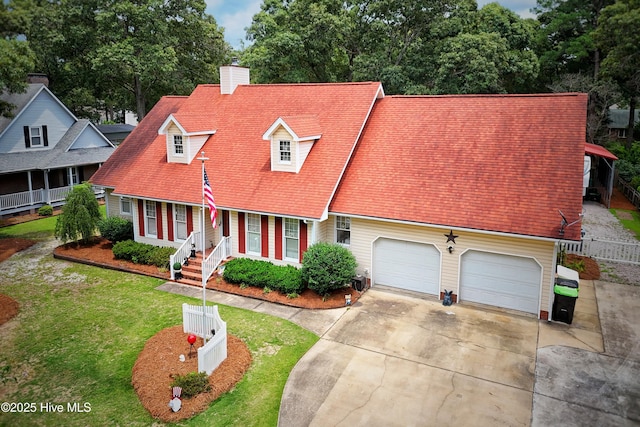 1992 Acorn Dr, New Bern, NC 28562 - view of front of house featuring a chimney, driveway, and covered porch