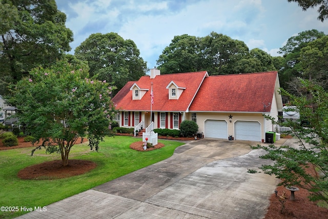 1992 Acorn Dr, New Bern, NC 28562 - cape cod house with concrete driveway, a garage, a chimney, and covered porch