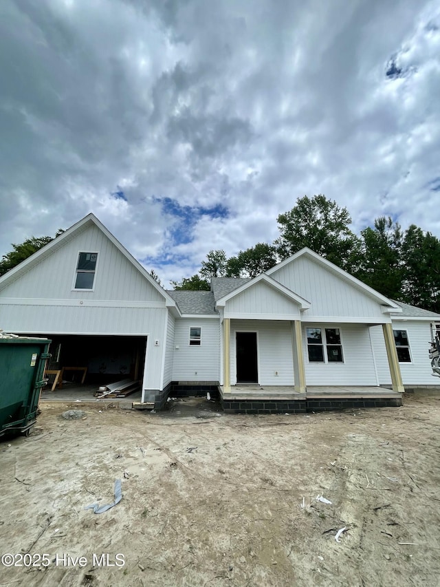 169 Howard Rd, Newport, NC 28570 - view of front of house featuring an attached garage and roof with shingles