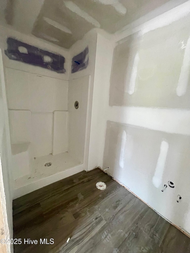 169 Howard Rd, Newport, NC 28570 - full bathroom featuring wood finished floors and a shower