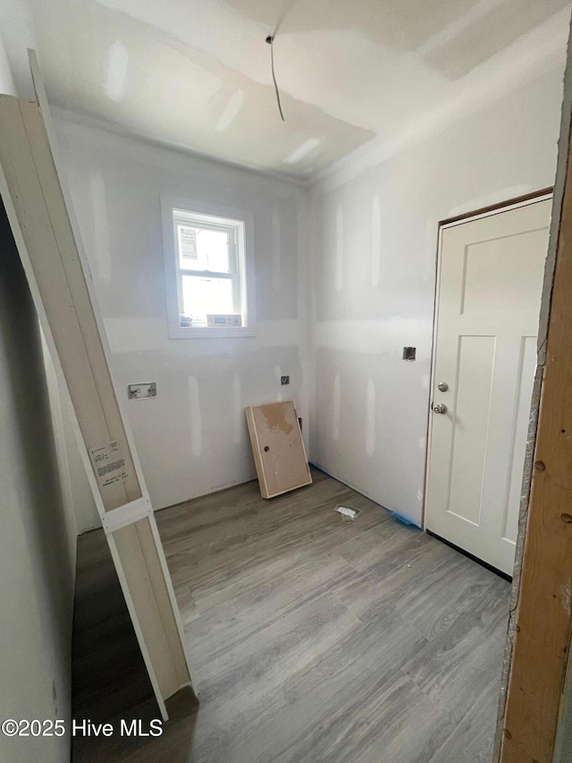 169 Howard Rd, Newport, NC 28570 - laundry area with wood finished floors