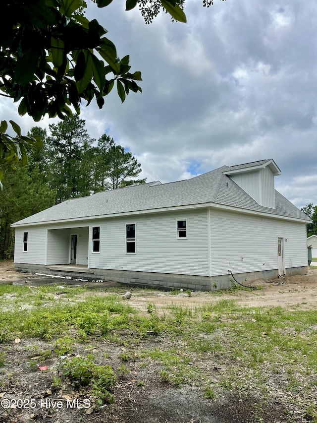 169 Howard Rd, Newport, NC 28570 - view of side of home featuring roof with shingles