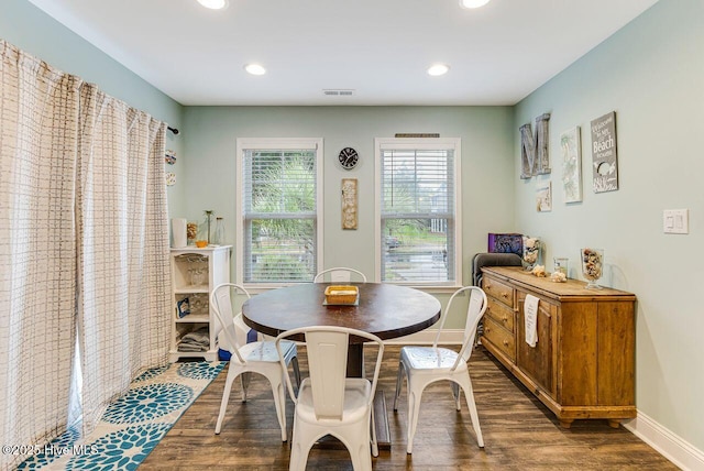 227 NE 38th St, Oak Island, NC 28465 - dining space with dark wood finished floors and recessed lighting