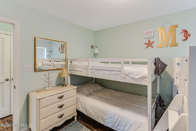 227 NE 38th St, Oak Island, NC 28465 - bedroom with wood finished floors