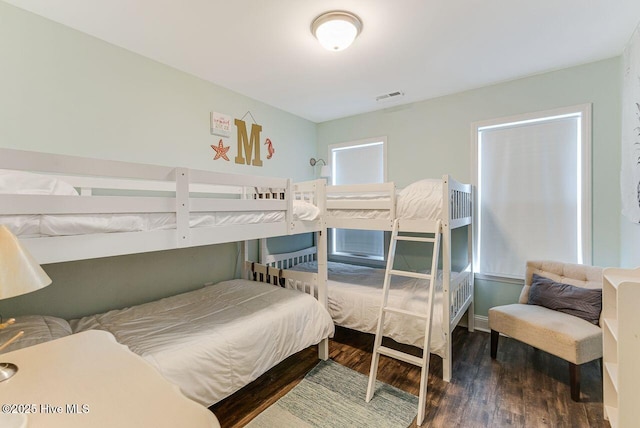 227 NE 38th St, Oak Island, NC 28465 - bedroom with wood finished floors