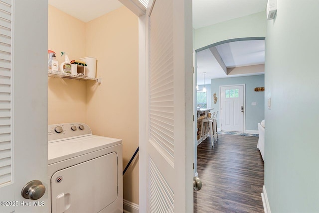 227 NE 38th St, Oak Island, NC 28465 - washroom with washer / dryer, arched walkways, and dark wood-style floors