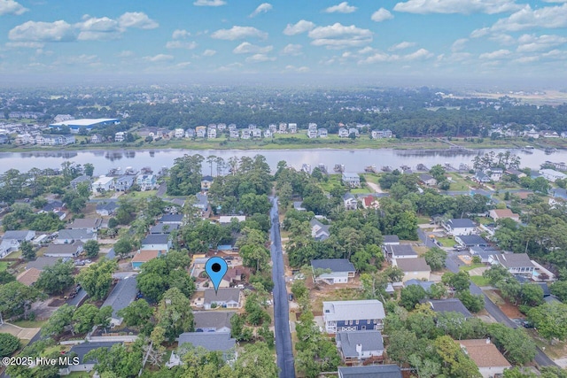 227 NE 38th St, Oak Island, NC 28465 - aerial view of property's location featuring a large body of water and nearby suburban area