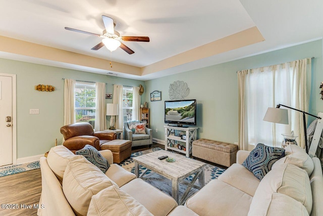 227 NE 38th St, Oak Island, NC 28465 - living room with ceiling fan and wood finished floors
