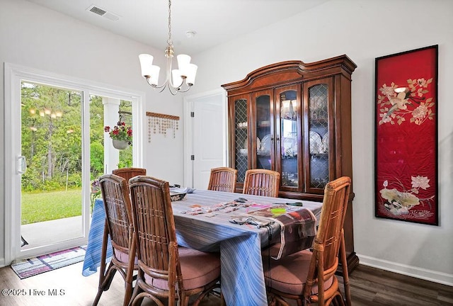1807 St Patricks Ct SE Lot 267, Bolivia, NC 28422 - dining area with a chandelier, wood finished floors, and baseboards