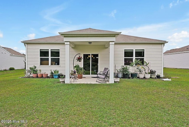1807 St Patricks Ct SE Lot 267, Bolivia, NC 28422 - back of property with a patio area and a yard