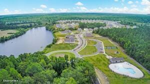 1807 St Patricks Ct SE Lot 267, Bolivia, NC 28422 - view of property location with a nearby body of water and a heavily wooded area