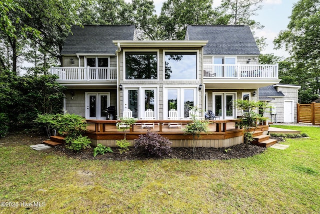 302 Plantation Dr, New Bern, NC 28562 - back of house with a balcony, french doors, a lawn, and a shingled roof