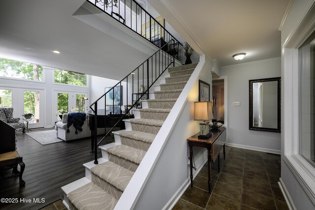 302 Plantation Dr, New Bern, NC 28562 - stairs featuring ornamental molding, baseboards, and recessed lighting