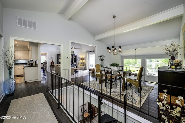 302 Plantation Dr, New Bern, NC 28562 - dining room featuring beam ceiling, dark wood-type flooring, a chandelier, and high vaulted ceiling