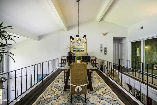302 Plantation Dr, New Bern, NC 28562 - dining area featuring wood finished floors, a chandelier, beamed ceiling, and high vaulted ceiling