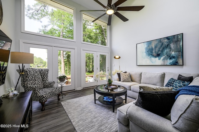 302 Plantation Dr, New Bern, NC 28562 - living area featuring a high ceiling, a ceiling fan, healthy amount of natural light, dark wood-style floors, and french doors
