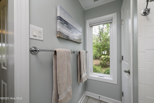 302 Plantation Dr, New Bern, NC 28562 - bathroom featuring crown molding, baseboards, and tile patterned floors