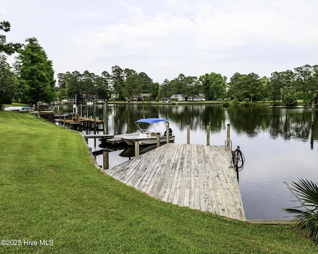 302 Plantation Dr, New Bern, NC 28562 - dock area featuring a lawn and a water view