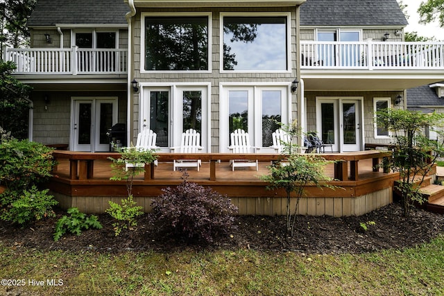 302 Plantation Dr, New Bern, NC 28562 - back of property with a balcony, a shingled roof, and french doors